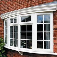 White bow window with Georgian bars