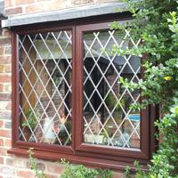 Mahogany window with diamond lead